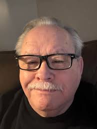 Who is playing the holiday festival concert?