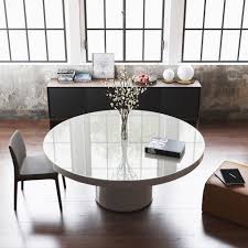 It's made from engineered wood with a solid ash base. Modern Berkeley Table By Modloft