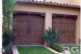 Like The Garage Doors I Probably Wouldn T Put Grass In The Drive Way Like That Though Garage Doors Garage Door Design Custom Wood Garage Doors