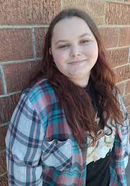 Can you fix my niece's hair in this photo?