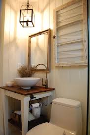 There is a bath to ceiling window beside a deep and luxurious bathtub which. Home Invasion Small Rustic Bathrooms Country Bathroom Vanities Small Country Bathrooms