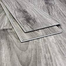 At $8 per square foot for lvp's $16 for wood, lvp costs considerably less. Ambient Rigid Core Luxury Vinyl Plank Waterproof Lvp Flooring Sample Color Wilde Acacia Amazon Com