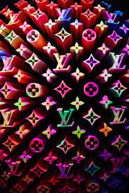 Louis Vuitton Monogram Logo Photo Free Pattern Image On Unsplash Iphone Wallpaper Tumblr Aesthetic Iphone Wallpaper Louis Vuitton Iphone Wallpaper