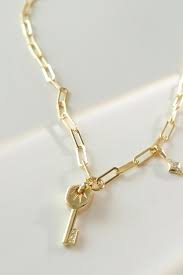 Make a wish and put on your necklace. All Things Are Possible Key Gold Necklace Shopperboard