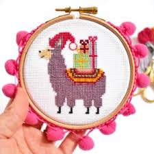 Colorful butterflies, dragonflies, a folk santa, ivy, and a spooky halloween design. How To Make A Cross Stitch Christmas Card With Free Christmas Cross Stitch Patterns Hannah Hand Makes