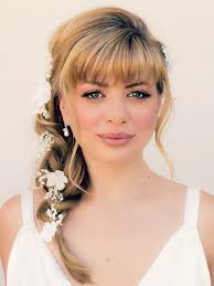 If straight hairstyles are more your thing, give this beautiful long bob a try. 40 Beautiful Brides With Bangs