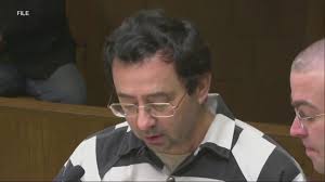 Disgraced doctor Larry Nassar stabbed multiple times in prison, AP sources  say