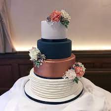 Rose Gold And Navy Wedding Cake Rosegold Weddingcake Navy Wedding 4tier Buttercreamcake Sug Rose Gold Wedding Cakes Wedding Cake Navy Wedding Cake Roses