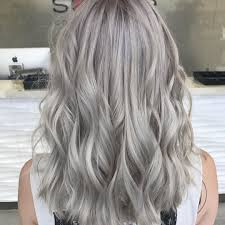 For cooler blonde, i would do a heavy highlight all over with a cream bleach mixed with a low volume to get as much warmth out as possible. We Re Calling It Icy Blonde Is The Season S Coolest Hair Color Better Homes Gardens