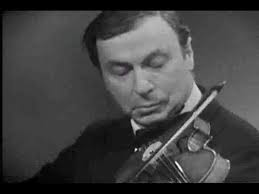 Dr. Quinton Morris conducts violin masterclass