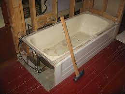 This cannot be removed like paint or added coatings. Cast Iron Tub Removal