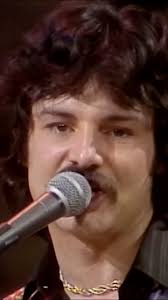 Throwback to Burton performing "Be-Bop-a-Lula" written by Gene Vincent et al.  Burton's cover of the song was released