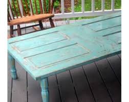 Our reclaimed oak wood coffee table with hand welded steel legs is made from reclaimed wood salvaged from a midwestern barn and hand planed to perfection to give it a polished/finished look while maintaining the beauty of reclaimed wood. Door Coffee Table Etsy