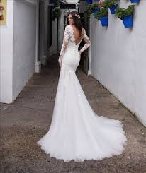 Our mermaid & trumpet wedding dresses come in a variety of sizes & styles, including for a cute and comfortable cut, slip into a long mermaid style wedding dress with a natural waistline and halter straps. Mermaid Long Sleeves Wedding Gown With A Lace Skirt Modes Bridal Nz