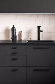 Ikea Just Released The Sleekest Kitchen Cabinets All Made From Recycled Materials Sleek Kitchen Cabinets Sleek Kitchen Black Kitchen Cabinets