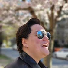 What are the implications of buying a 2-year-old building with roof leaks,  parkade cracks, and low contingency reserve fund?