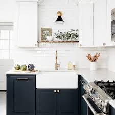 Integrated beautifully into the danby marble countertop and backsplash with new fixtures it is a real joy to clean up. Sconce Above Kitchen Sink Design Ideas