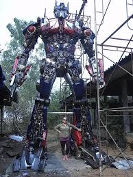 Optimus prime bonecrusher drawing line art optimus prime truck png. Giant Transformers Assembled From Spare Car Parts