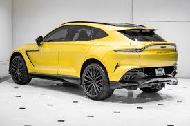 Image result for Cosmopolitan Yellow 2023 Aston Martin