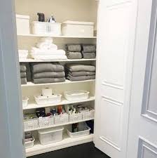 I love the simplicity of the matching baskets in the actual closet but the best part is definitely the hanging wire baskets on the inside of the door! Pin On Home Decor Organization