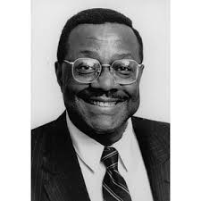 Dr. Joseph Warren, Director of Community Affairs, sitting in his office