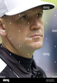 Referee Clete Blakeman stands