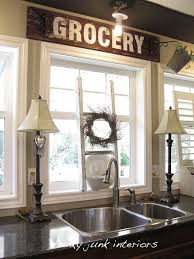 vintage sign above kitchen sink funky