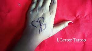 If you are planning to get a letter l tattoo and looking for some inspiration then you will find the below collection of letter l tattoo designs and templates very helpful to design your next tattoo. Tattoo Design Ideas Stylish L Letter Tattoo On Hand Fashion Wing Youtube