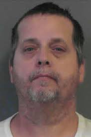 Two men arrested for allegedly burning deceased body in Rossville