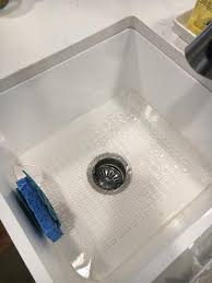 The cut outs for the sink hole, in order to pull it back, are too long, which makes it very loose. Vigo 30 Matte Stone Farmhouse Kitchen Sink