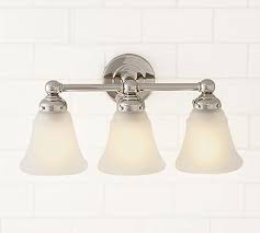 Crafted of metal with a choice of white, navy or brushed nickel colors. Sussex Triple Sconce Bathroom Light Fixtures Bathroom Lighting Sconce Lighting