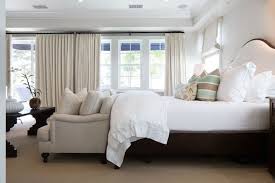 This may strike some as a stupid question, but why do so many people (apparently) place a bench at the foot of the bed? Sofa At Foot Of The Bed Transitional Bedroom Kelly Nutt Design
