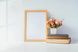 Download Premium Psd Mockup Photo Frame With Yellow Flowers And Ribbon On White Background PSD Mockup Templates