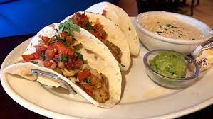 Drain the marinated white fish and gently place into the melted butter and spread the fish out evenly. Fish Tacos Picture Of Bahama Breeze Island Grille Orlando Tripadvisor