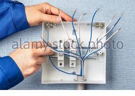 Electrical wiring can be tricky—especially for the novice. Technician Installing A New Switchboard With Automatic Fuses For Household Electrical Wiring Installation Of Fuse Boxes In A Residential Building An Stock Photo Alamy