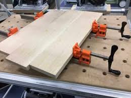 In order to use a wood lathe, lock a piece of wood into the head stock and tail stock, start the tool at its slowest speed and support the tool with the blad. Woodworking Clamps Guide Handyman Tips