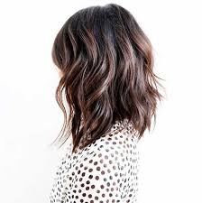 Messy do with shaggy bangs 30 Short Layered Haircuts For Wavy Hair Checopie