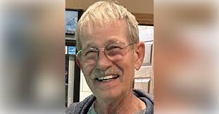 Obituary information for John E. White