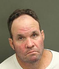 NAME: MALONE, CHRIS BRENT Booking Number: 25014471 Race: WHITE Gender: MALE  Age: 58 Last Known Location: Cell: Date: 05/21/2025 Arresting Agency:  Charge/Court Case Number: BATTERY/ASSAULT 📷 SOURCE: ORANGE COUNTY  CORRECTIONS DEPT. Notice: “