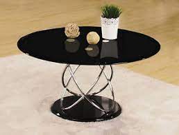 This uniquely simple form creates a these beautiful round glass coffee tables are available with a choice of glass table tops in red. Coffee Table Black Glass Round Top 80cm Chrome Spiral Frame Black Round Base Ebay