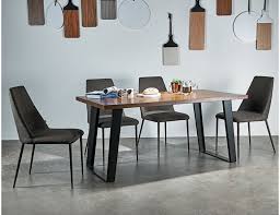 A coffee table is an important piece of furniture that enables us to do so many things. Bloc Teak Wood Dining Table
