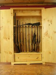 This set up holds 14 rifles and 12 handguns vertical. Hand Made Wooden Gun Storage Safe By Larue Woodworking Custommade Com
