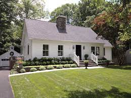 The homes are meant to blend into the landscape, however, still stand out with their charming character. Everything You Need To Know About Cape Cod Style Houses Cape Cod House Exterior Cape Cod Exterior Cape Style Homes