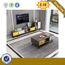 The tables can either match the height of the sofa or chair arm by which they're placed or sit slightly lower. Tv Stand Coffee Table Combination Set Mini Nordic Retractable Cabinet China Living Room Furniture Bedroom Furniture Made In China Com
