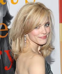 Bright blonde at the ends of your hair may overwhelm your face and style, but warmer, caramel tones work to illuminate your face instead. Rachel Mcadams Medium Straight Light Blonde Hairstyle With Side Swept Bangs