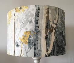 Trees in grey drum shaped lampshade. Birch Trees Lampshade Grey And Ochre Fabricate Ireland