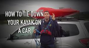 Once youâ€™re confident that the bow of your kayak is secure in the channel of your j rack, swing around to the stern. How To Tie Down Your Kayak On A Car Jackson Adventures