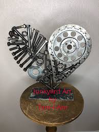 Junkyard Art By Tam I Am Repurposed Timing Chain And Sprocket Along With Nuts And Bolts Welded Together To Make Pieces Scrap Metal Art Metal Art Scrap Metal