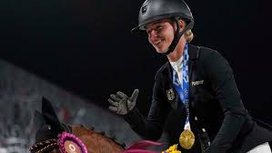 She represented her country at the 2016 summer olympics , where she won the silver medal in the team eventing. Kyqgyhmccc0p0m