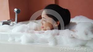 To make your own calming bubble bath you'll need: Woman Relaxing And Takes Bubble Bath In Bathtub With Foam Stock Footage Video Of Health Relaxation 194933030